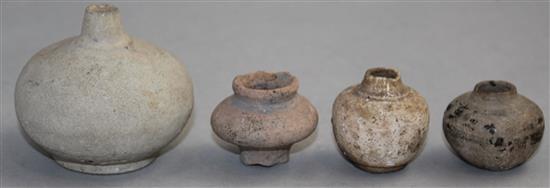 Four South East Asian pottery jarlets, c.300 AD, largest 6.5cm